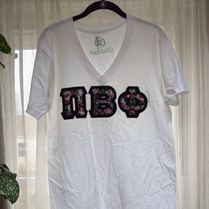 White V-Neck T-Shirt with Floral Greek Letters